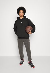 Jordan Kapuzenpullover - black/white