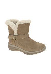 Bruine suède enkelboots met een nepbontvoering, verstelbare banddetails en een dikke rubberen zool voor comfort en grip.