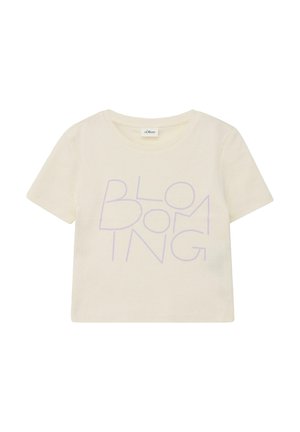 T-shirt court à manches courtes de couleur crème avec le texte "BLOOMING" en violet clair, écrit en grandes lettres fines et ludiques sur le devant.