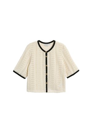 Gebreide cropped cardigan in ivoor met zwart trim, voorzien van een bloemenpatroon, driekwart mouwen en gouden knopen aan de voorkant.