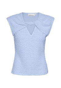 Haut bleu clair en tissu texturé. Dispose d'un décolleté en V et de manches courtes, avec un détail torsadé près du col.