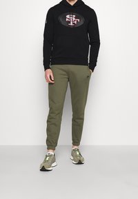 New Era Klubbkläder - black