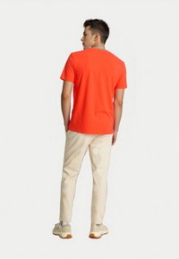 U.S. Polo Assn. KURZARM REITER - Camiseta estampada - rot