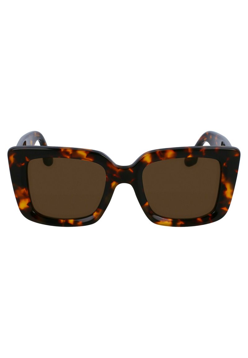 Óculos de sol com padrão tartaruga, lentes castanhas, forma quadrada, armações largas e acabamento brilhante. Apresenta detalhes pronunciados nas hastes.