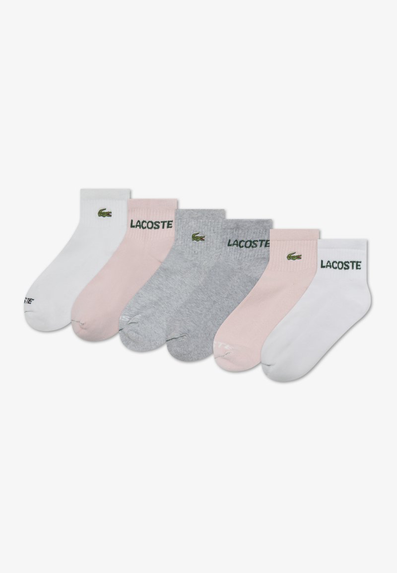 Set of six crew socks in white, pink, and grey. Each sock features a ribbed cuff and the 'Lacoste' logo with an alligator accent.