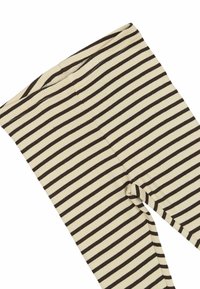 Geribbelde legging in cremewit met donkergroene horizontale strepen. Beschikt over een elastische tailleband en aansluitend ontwerp voor comfort.