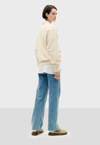 Thinking Mu METHAMORPHOSIS - Sudadera - ivory