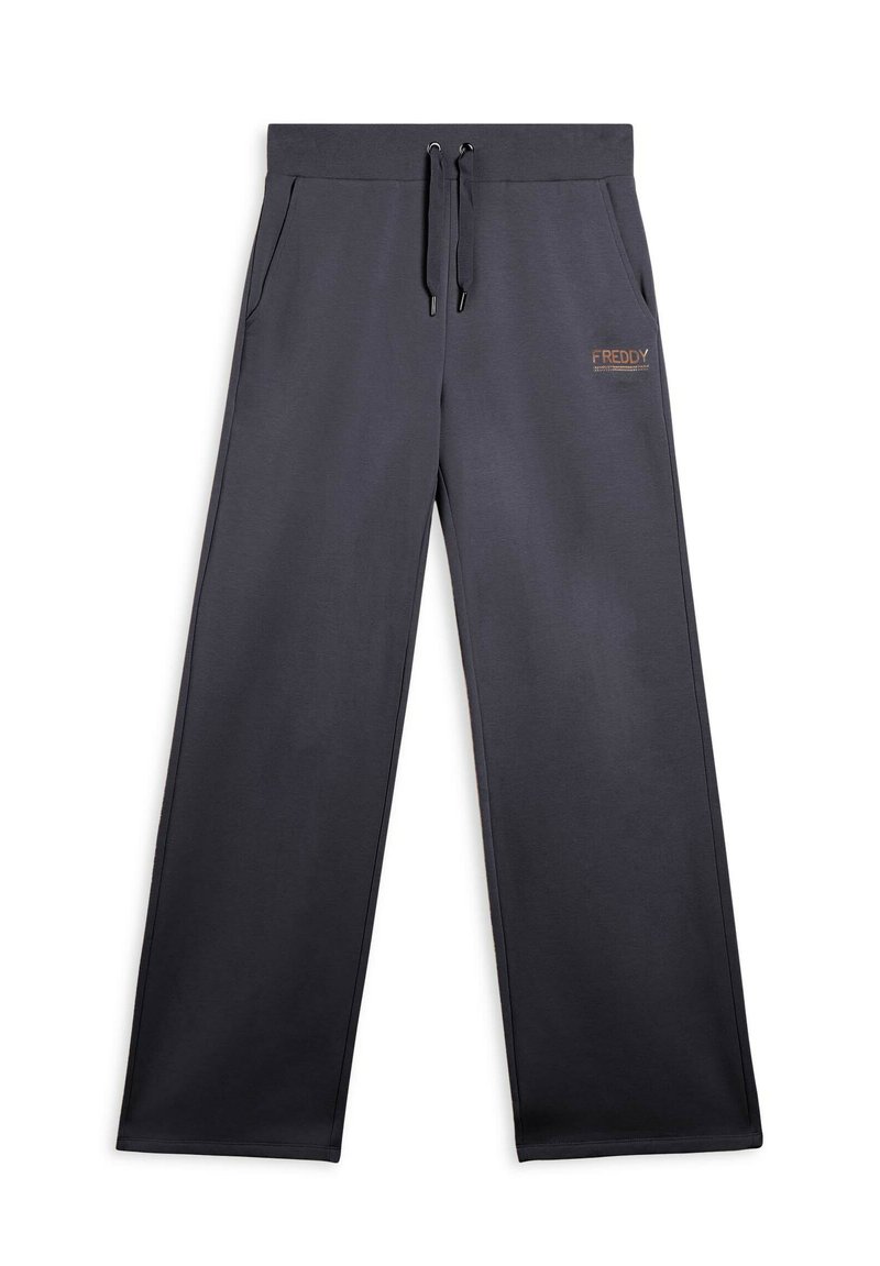 Pantaloni sportivi grigio scuro realizzati in morbido tessuto, con vita elasticizzata e cordino, tasche laterali e un piccolo logo dorato.