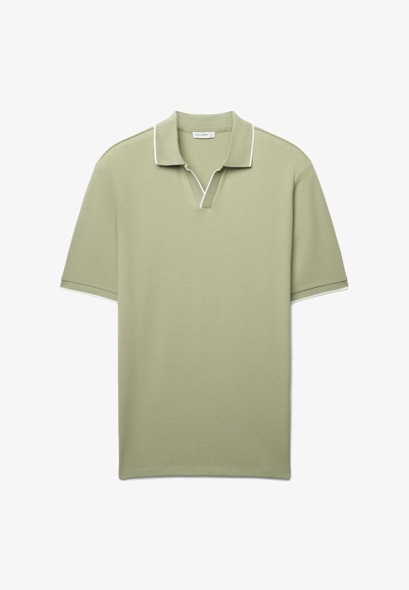 Polo verde con superficie strutturata, maniche corte e colletto bordato di bianco. Presenta un design con scollo a V e vestibilità rilassata.