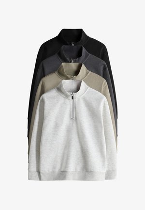 Keturi sulankstyti ketvirčio užtrauktuko džemperiai, išdėstyti vertikaliai, juodos, tamsiai pilkos, smėlio spalvos ir šviesiai pilkos spalvų.