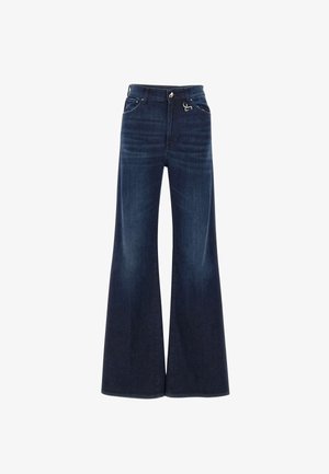 Wide-leg jeans in dark blue denim, featuring a high waist, five pockets, and a subtle fade. Includes hardware accents on the waistband.