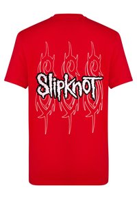 Rød bomull t-skjorte med hvite tribal design og "Slipknot" logo i stilisert svart tekst på baksiden. Korte ermer, standard passform.