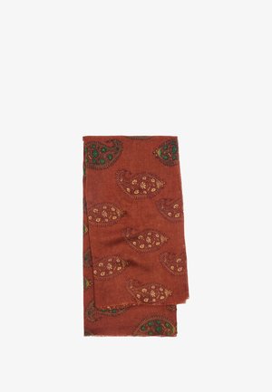 Szalik w kolorze rdzy z wzorem paisley w odcieniach zieleni, złota i kremu. Wykonany z teksturowanej tkaniny z postrzępionymi brzegami.