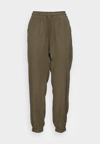 Pantalon jogger kaki en tissu léger, doté d'une taille élastique, d'un cordon de serrage ajustable et de poignets élastiques aux chevilles.