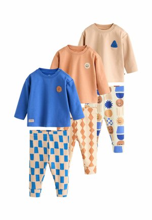 Four sets of children's clothing: two long-sleeve tops in blue and beige, and two pairs of patterned pants with geometric and character designs.