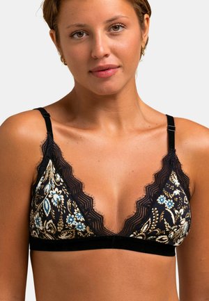 Bralette noir avec des finitions en dentelle, présentant un motif floral en bleu et beige. Brides réglables et décolleté plongeant. Texture en tissu doux.