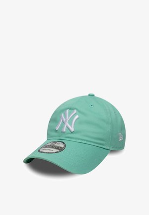 Mint green adjustable baseball cap with white New York Yankees logo embroidered on front and a curved brim.