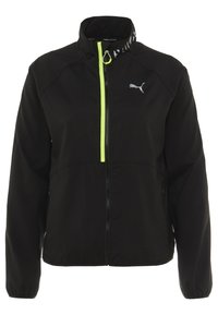 Musta Puma juoksutakki, jossa on neonkeltaiset pystysaumaväritykset ja heijastava Puma-logo rinnassa, joustavat hihansuut ja korkea kaulus.