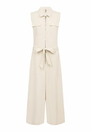 Bež onesie brez rokavov s sprednjim zadrgo, dvema prsoma žepoma, pasom, ki ga je mogoče zavezati, in širokimi hlačnicami. Narejen iz lahkega materiala.