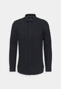 Camicia nera a maniche lunghe con bottoni, realizzata in tessuto testurizzato, caratterizzata da un colletto classico, bottoni frontali e un orlo curvo.