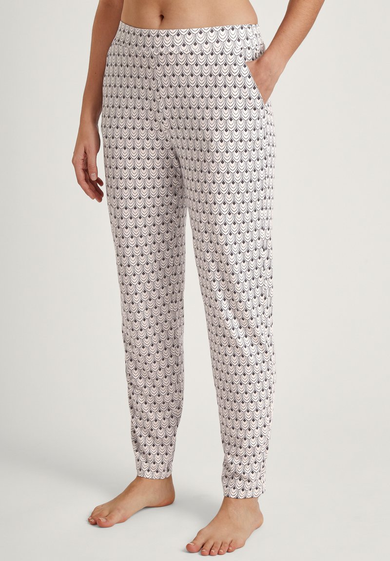 Lichte katoenen pyjamabroek met een witte achtergrond en een marineblauw golfpatroon, voorzien van een comfortabele elastische tailleband en zijzakken.