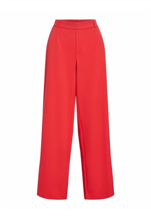 Czerwone spodnie o szerokich nogawkach z wysokim stanem i szlufkami na pasek, z przodu z plisami i bocznymi kieszeniami, uszyte na luźny krój.