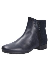 Bottines en cuir bleu marine avec une finition lisse, dotées d'un panneau arrière en daim, de clous décoratifs et d'un petit talon empilé.