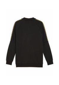 Sort sweatshirt lavet af blødt stof, med lange raglanærmer og en høj krave, samt et gult mønstret pynt langs skuldrene.