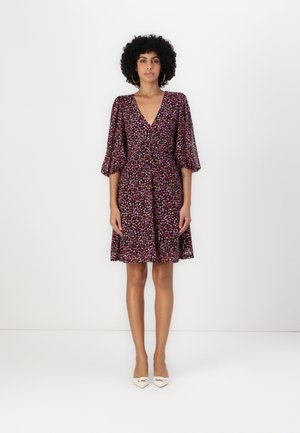 Floral print dress with a deep V-neck, puffed sleeves, and a fitted waist. Made of lightweight fabric in pink, purple, and black colors.