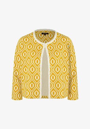 Gul cardigan med et geometrisk mønster i creme, brede ærmer og et åbent frontdesign med en struktureret finish.