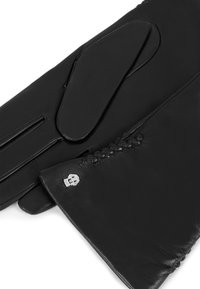 Black leather gloves with a smooth texture, featuring a braided accent and silver hardware logo on the wrist. Detailed stitching visible.