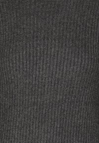 Dark grey, ribbed knit fabric with a soft texture. The material has vertical stripes, creating a subtle pattern across the surface.