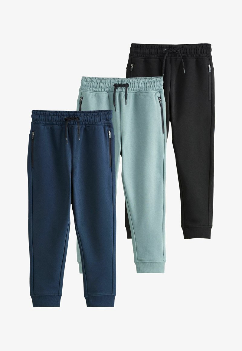 Trois paires de pantalons de survêtement en bleu marine, bleu turquoise clair et noir. Fabriqués en tissu doux, avec des ceintures élastiques et des poches zippées sur les côtés.
