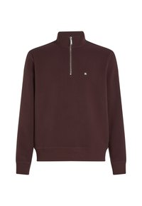 Burgundi pulóver, negyed cipzárral, bordás mandzsettákkal és hem, valamint egy kis fehér logóval a mellkason. Puha anyagból készült.