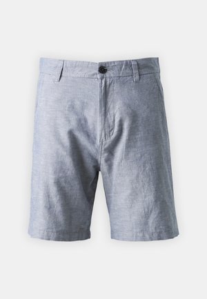 Pantaloni corti azzurri chiari in tessuto intrecciato, con chiusura a bottone, due tasche frontali e una superficie leggermente testurizzata.
