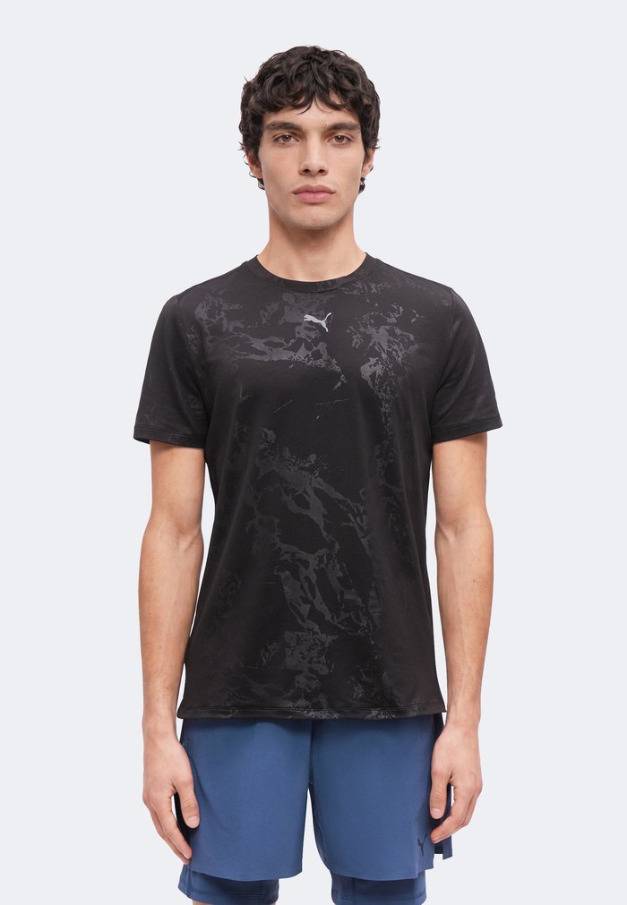 PUMA EMBOSSED TEE - Sports T-shirt - black