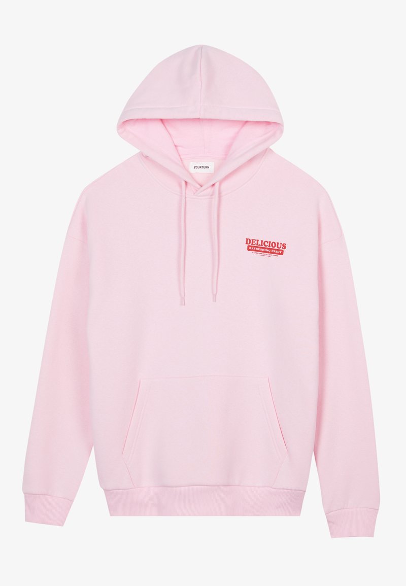 Šviesiai rožinis džemperis su gobtuvu, pagamintas iš minkštos medžiagos, turintis priekinę kengūros tipo kišenę, reguliuojamą raištelių gobtuvą ir raudoną "DELICIOUS" grafiką ant krūtinės.