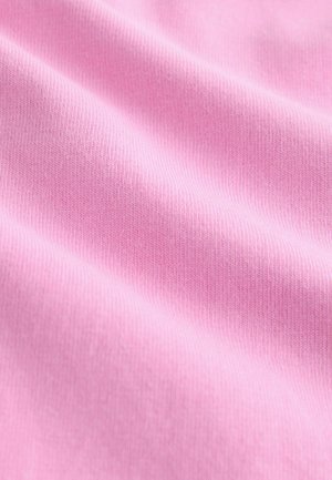 Light pink cotton fabric with a smooth texture and subtle ribbed pattern, showing soft folds and drapes.