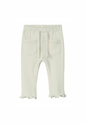 Pantalons blancs texturés avec un motif côtelé, taille élastique, deux poches avant et ourlets froncés aux chevilles.