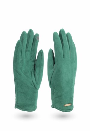Guanti in suede verde con una superficie liscia, caratterizzati da un piccolo accentuazione metallica sul polso e una punta compatibile con il touchscreen.