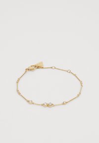 Bracelet en or avec de fins maillons allongés ornés d'accents clairs ronds et en forme de diamant, y compris des détails scintillants ressemblant à des gemmes et un fermoir en forme de homard.