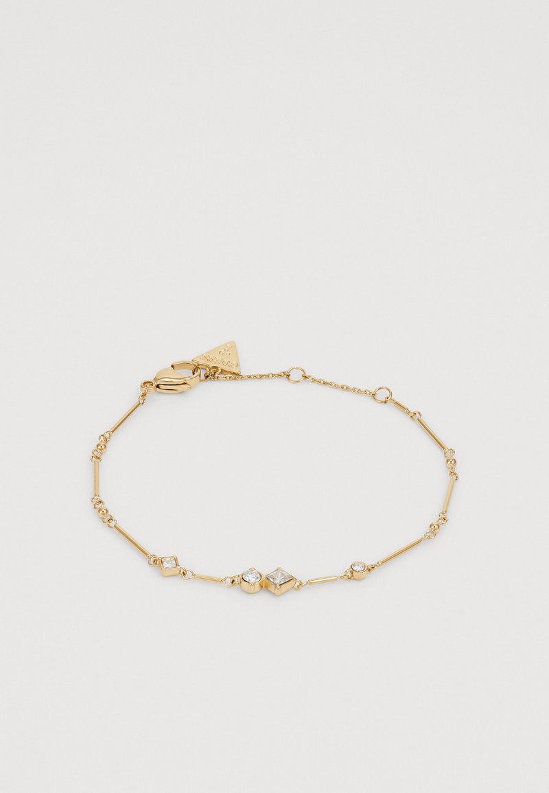 Bracelet en or avec de fins maillons allongés ornés d'accents clairs ronds et en forme de diamant, y compris des détails scintillants ressemblant à des gemmes et un fermoir en forme de homard.