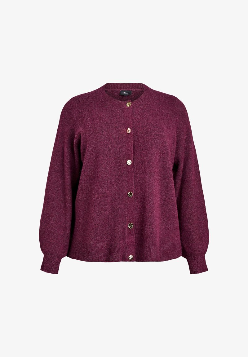 Burgundyröd kofta i mjukt stickat material, med rund hals, långa ärmar och metallknappar framtill. Avslappnad passform.