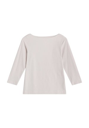 Chemise beige clair à manches longues avec encolure bateau et coupe simple et droite, présentée sur fond blanc.