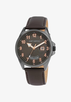 Brown leather strap watch with a dark gray dial, large white and rose gold numeral markers, and a date and day display at 3 o'clock.