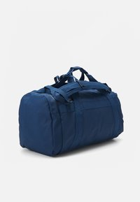 Björn Borg DUFFLE BAG 55L UNISEX - Športna torba - blue wing teal