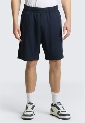 - Spodnie treningowe