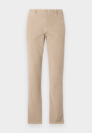 Beige spalvoti medvilniniai kordūriniai kelnes su tiesiomis kojomis, turinčios mygtuko užsegimą, penkias kišenes ir lygų paviršių.
