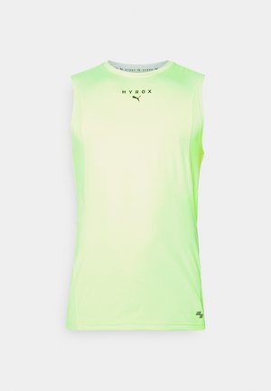 Zielona bezrękawnik sportowy z gradientowym przejściem od jasnej do jasnej zieleni. Posiada okrągły dekolt i czarne logo marki na piersi.