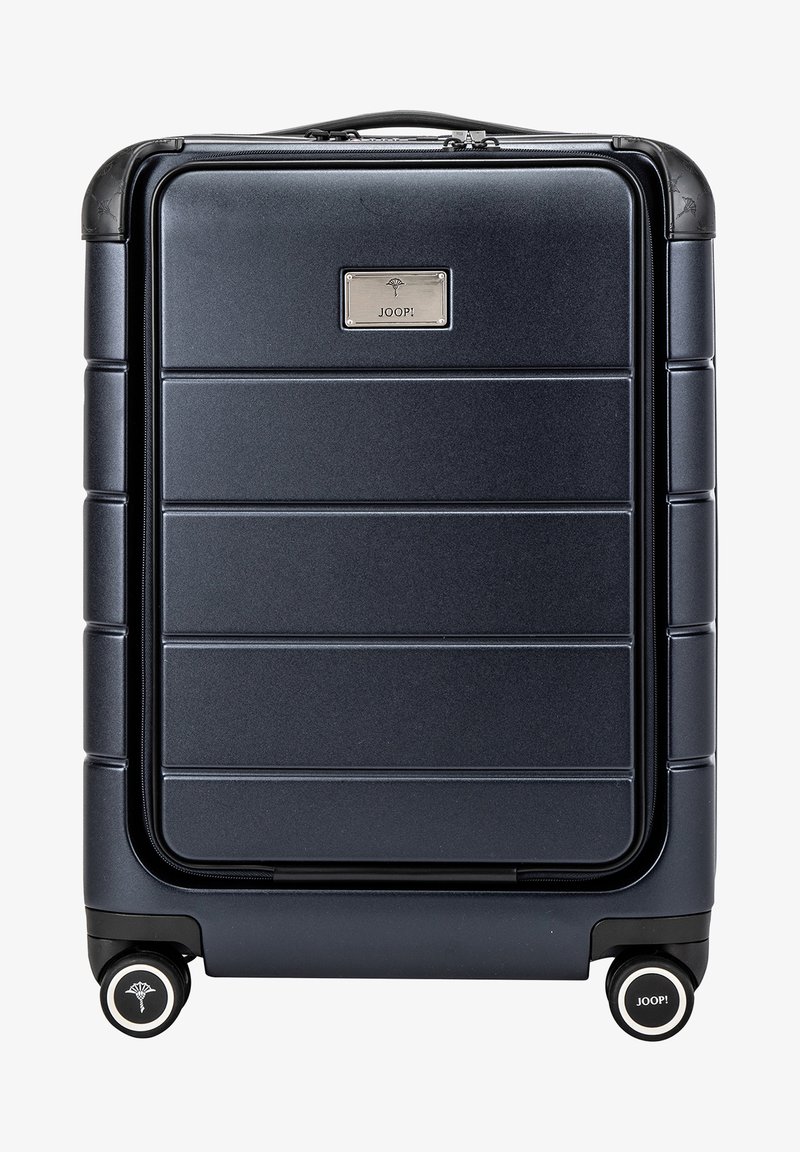 Hårt resväska i mörk marinblå med horisontella ränder, eleganta design, topphandtag och fyra hjul. Utrustad med en metallisk logoplåt.